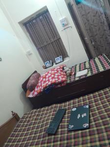Bedroom Image of Basak Guest House  in Bhowanipore, Kolkata