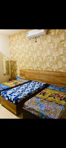Bedroom Image of Girls Pg in Sector 27, Noida