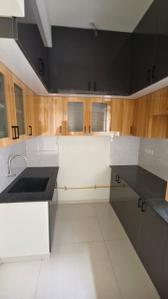 Kitchen Image of 1100 Sq.ft 2 BHK Apartment / Flat for rent in Casagrand First City, Sholinganallur Chennai for Rs. 30000
