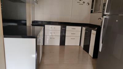 Kitchen Image of 850 Sq.ft 2 BHK Apartment / Flat for rent in Nirman Brookefield Willows, Pisoli Pune for Rs. 27000