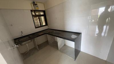 Kitchen Image of 650 Sq.ft 2 BHK Apartment / Flat for sale in ARC Aura, Andheri West Mumbai for Rs. 15500000
