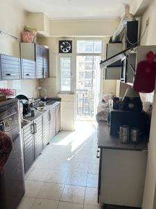 Kitchen Image of 1324 Sq.ft 3 BHK Apartment / Flat for sale in Amrapali Zodiac, Sector 120 Noida for Rs. 12500000