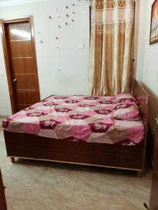 Bedroom Image of 1000 Sq.ft 2 BHK Builder Floor for rent in Sector 63 A Noida for Rs. 29000