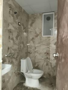 Common Bathroom Image of 1050 Sq.ft 2 BHK Apartment / Flat for sale in Aambesten Twin Celestial, Noida Extension Greater Noida for Rs. 4250000