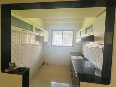 Kitchen Image of 650 Sq.ft 1 BHK Apartment / Flat for sale in Charms Paradise, Titwala Thane for Rs. 2700000