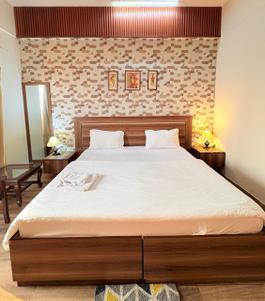 Bedroom Image of 435 Sq.ft 1 RK Studio for rent in Paramount Pine And Oak Studio, Surajpur Greater Noida for Rs. 15000