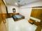 Manikaran Apartment Bedroom 1