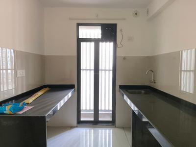 Kitchen Image of 714 Sq.ft 2 BHK Apartment / Flat for rent in Runwal My City Phase II Cluster 05 Part II, Usarghar Thane for Rs. 12999