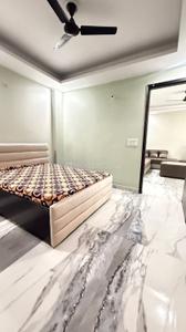 Bedroom Image of 950 Sq.ft 2 BHK Builder Floor for rent in Khirki Extension New Delhi for Rs. 32000