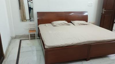 Bedroom Image of 1250 Sq.ft 2 BHK Builder Floor for rent in East Of Kailash New Delhi for Rs. 45000