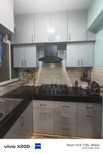 Kitchen Image of 1000 Sq.ft 2 BHK Apartment / Flat for rent in Satyam The Palm Residency, Mahalgaon Gwalior for Rs. 22000