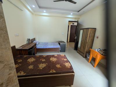 Bedroom Image of Apna Niwas girls pg  in Sector 64, Noida