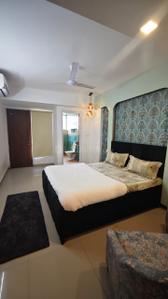 Bedroom Image of 1000 Sq.ft 2 BHK Builder Floor for rent in Sector 122 Noida for Rs. 45000