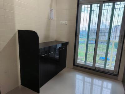 Kitchen Image of 715 Sq.ft 1 BHK Apartment / Flat for rent in Gajra Bhoomi Gardenia 1, Kalamboli Navi Mumbai for Rs. 18000