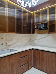 Kitchen Image of 600 Sq.ft 2 BHK Apartment / Flat for sale in Hans Builders Floor, Dwarka Mor New Delhi for Rs. 5000000