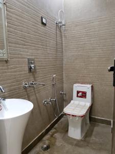 Common Bathroom Image of 810 Sq.ft 3 BHK Apartment / Flat for sale in Dwarka Mor New Delhi for Rs. 5000000