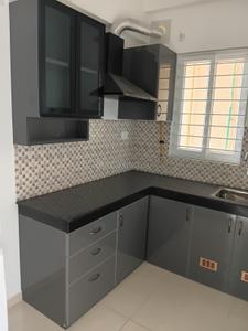 Kitchen Image of 700 Sq.ft 2 BHK Apartment / Flat for rent in Urbanrise Revolution One, Padur Chennai for Rs. 21000