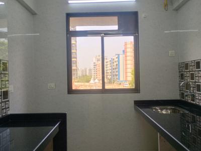 Kitchen Image of 710 Sq.ft 1 BHK Apartment / Flat for sale in Queens Court, Kalyan West Kalyan for Rs. 5500000