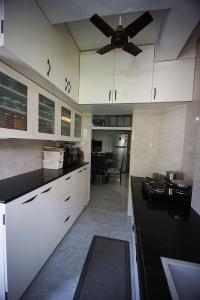 Kitchen Image of 828 Sq.ft 2 BHK Apartment / Flat for sale in Gurukul Ahmedabad for Rs. 6000000