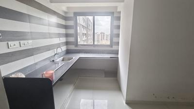 Kitchen Image of 1123 Sq.ft 3 BHK Apartment / Flat for sale in Unique Aashiyana, Gota Ahmedabad for Rs. 8500000