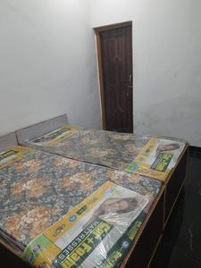 Bedroom Image of RR PG Coliving sec -63 noida in Sector 63 A, Noida