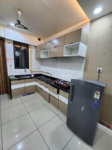 Kitchen Image of 1100 Sq.ft 3 BHK Apartment / Flat for rent in Shambhu Savan Signet, Radhika Park Rajkot for Rs. 34000