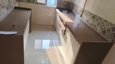 Kitchen Image of 1014 Sq.ft 3 BHK Apartment / Flat for rent in Vardhman Grandeur, Andheri West Mumbai for Rs. 100000