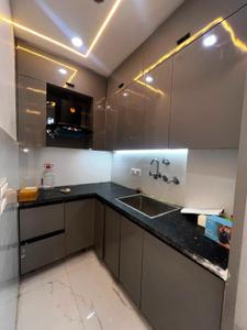 Kitchen Image of 850 Sq.ft 2 BHK Builder Floor for rent in Dwarka Mor New Delhi for Rs. 14000
