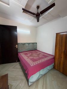 Bedroom Image of 900 Sq.ft 2 BHK Builder Floor for rent in Rajouri Garden New Delhi for Rs. 30000