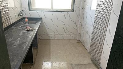 Kitchen Image of 960 Sq.ft 2 BHK Apartment / Flat for sale in Mohan Willows I, Badlapur East Badlapur for Rs. 3900000