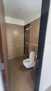 Bathroom Image of 700 Sq.ft 1 BHK Apartment / Flat for rent in Metro Paramount, Shilphata Thane for Rs. 17000