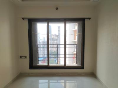 Bedroom Image of 550 Sq.ft 1 BHK Apartment / Flat for sale in Sangam Emporio Towers, Kandivali West Mumbai for Rs. 9800000