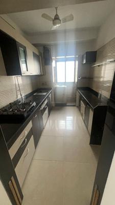 Kitchen Image of 950 Sq.ft 2 BHK Apartment / Flat for sale in Sudarshan Sky Garden, Kasarvadavali Thane for Rs. 10500000