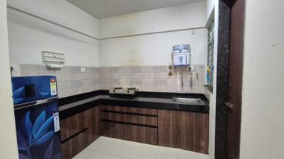 Kitchen Image of 1350 Sq.ft 3 BHK Apartment / Flat for rent in Yashada Splendid Courtyard, Lohegaon Pune for Rs. 38000