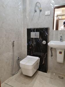 Common Bathroom Image of 600 Sq.ft 2 BHK Apartment / Flat for sale in PNM Affordable Homes, Dwarka Mor New Delhi for Rs. 3600000