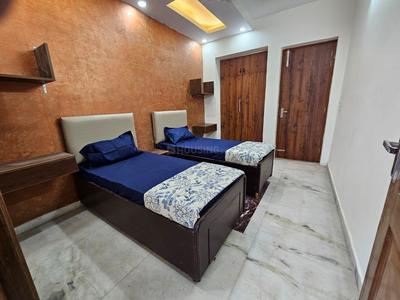 Bedroom Image of Sharma Boys Pg in Ashok Vihar, New Delhi