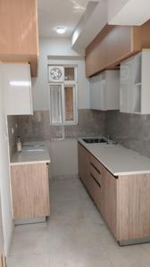 Kitchen Image of 990 Sq.ft 2 BHK Builder Floor for rent in Signature Global City, Sector 37D Gurgaon for Rs. 26000