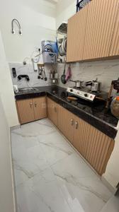 Kitchen Image of 950 Sq.ft 1 BHK Apartment / Flat for rent in Sector 46 Gurgaon for Rs. 28000