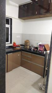 Kitchen Image of 650 Sq.ft 2 BHK Apartment / Flat for rent in Larkins Nest, Kasarvadavali Thane for Rs. 30000