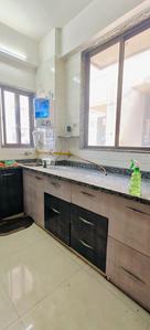 Kitchen Image of 1280 Sq.ft 2 BHK Apartment / Flat for rent in Ganesh Aaradhana Sky, Narolgam Ahmedabad for Rs. 17000