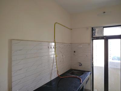 Kitchen Image of 780 Sq.ft 1 BHK Apartment / Flat for rent in Raunak Bliss, Kasarvadavali Thane for Rs. 18009