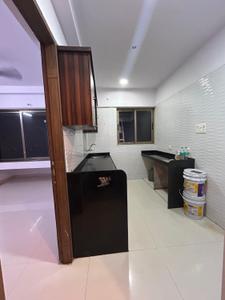 Kitchen Image of 810 Sq.ft 1.5 BHK Apartment / Flat for sale in Vishesh Balaji Symphony, Shilottar Raichur Navi Mumbai for Rs. 6800000