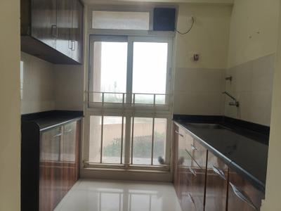 Kitchen Image of 650 Sq.ft 1 BHK Apartment / Flat for sale in Vijay Orovia, Hiranandani Estate Thane for Rs. 7000000