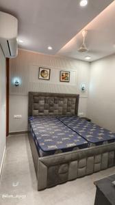 Bedroom Image of 600 Sq.ft 1 BHK Builder Floor for rent in Lajpat Nagar New Delhi for Rs. 40000