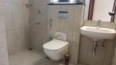 Bathroom Image of 624 Sq.ft 1 BHK Apartment / Flat for sale in Ivory Phase 2 At Brigade Orchards, Bychapura Bengaluru for Rs. 6300000