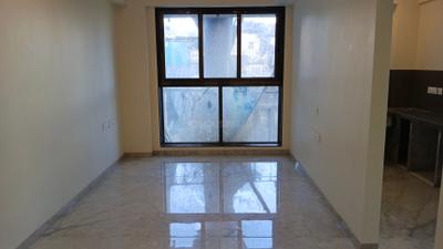 Living Room Image of 560 Sq.ft 2 BHK Apartment / Flat for sale in Ajmera Downtown, Kalbadevi Mumbai for Rs. 33600000