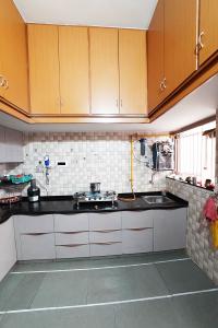 Kitchen Image of 1620 Sq.ft 4 BHK Independent House for sale in Ghatlodiya Ahmedabad for Rs. 23000000