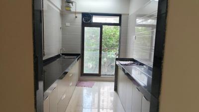 Kitchen Image of 1200 Sq.ft 3 BHK Apartment / Flat for sale in JE And VEE Om Trimurti, Malad East Mumbai for Rs. 31000000