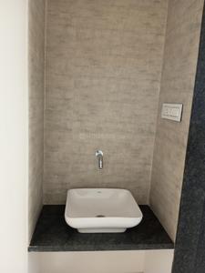 Bathroom Image of 945 Sq.ft 2 BHK Apartment / Flat for sale in Kosmic Kourtyard Phase 1, Wagholi Pune for Rs. 7000000