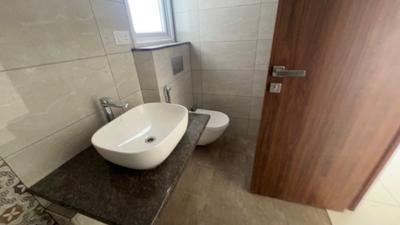 Bathroom Image of 605 Sq.ft 1 BHK Apartment / Flat for sale in Mahindra Eden, Jyotipuram Bengaluru for Rs. 8500000